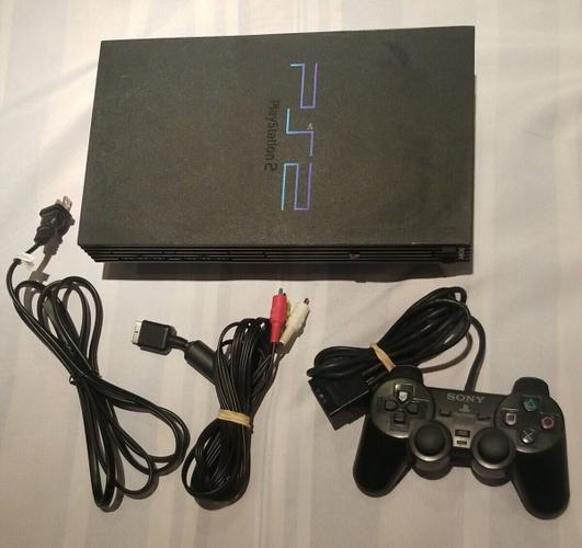 ps2 fat me nje kontroller nje cd loje
