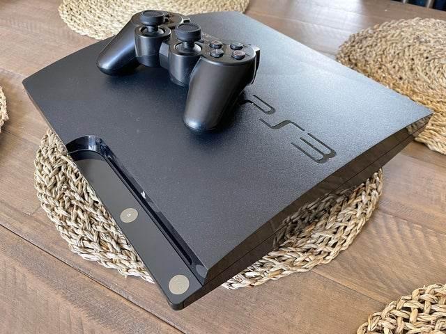ps3 slim+qip ( kemi edhe aksesor tjera )